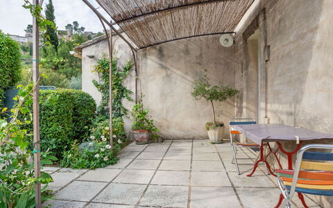 Ménerbes 603: Plant, Table, Building, Road Surface, Chair, Flowerpot, Outdoor Furniture, House, Residential Area, Real Estate