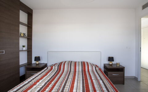 Le Grey Pearl: Bed, Furniture, Interior Design, Bedroom, Wall, Floor, Flooring, Wood, Room, Ceiling