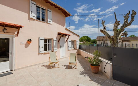 Elena: Table, Furniture, Water, Property, Sky, Building, Cloud, Chair, Outdoor Table, Outdoor Furniture