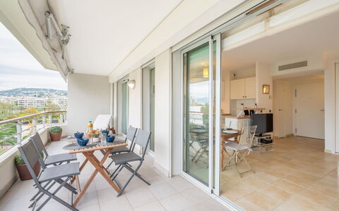 Cannes 535: Furniture, Table, Building, Chair, Window, Wood, Flooring, Shade, Floor, Porch